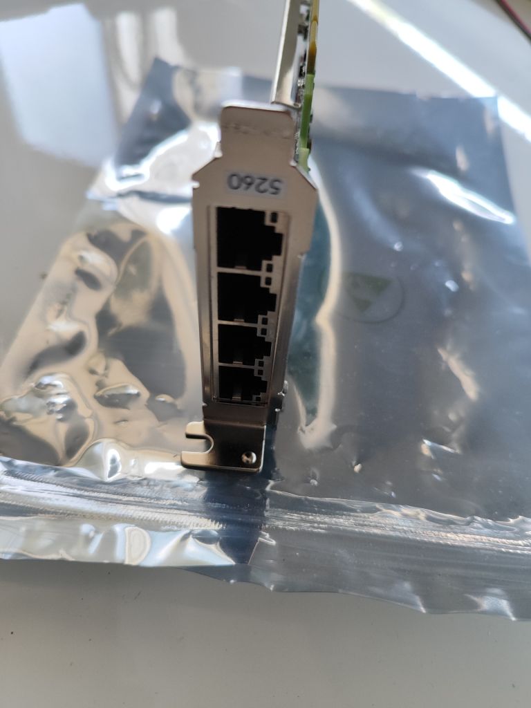 Мережева карта Broadcom BCM95719A1904G 4x1GbE - фото фото фото 2