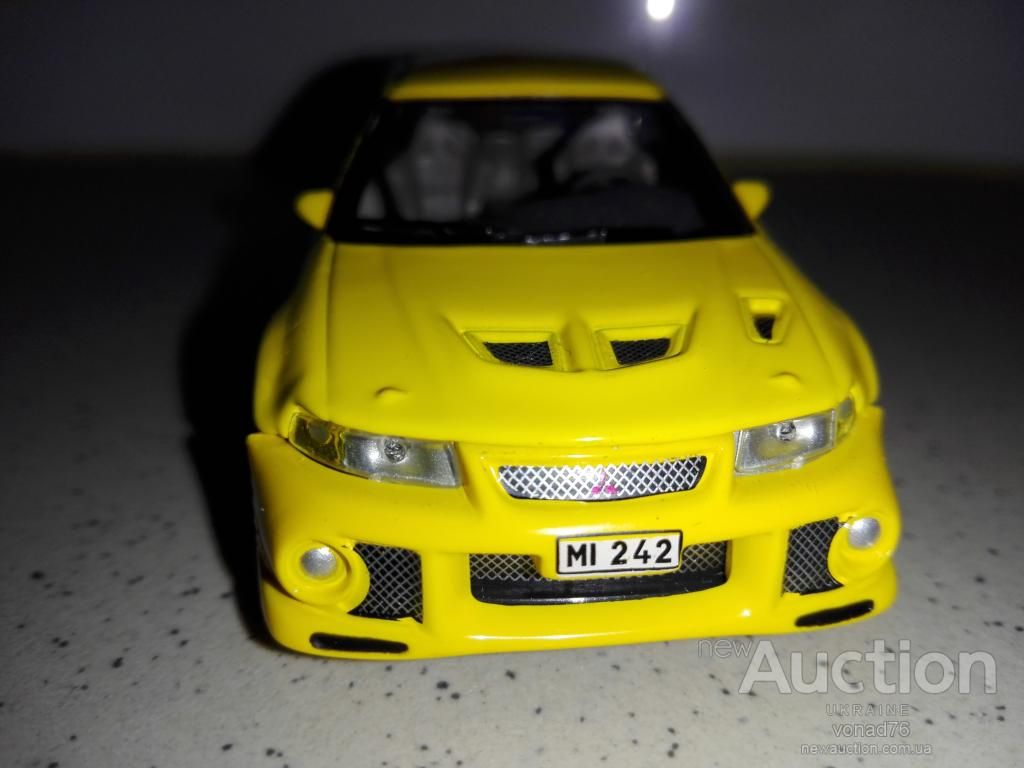1/43 MITSUBISHI LANCER. CARARAMA. - фото фото фото 3