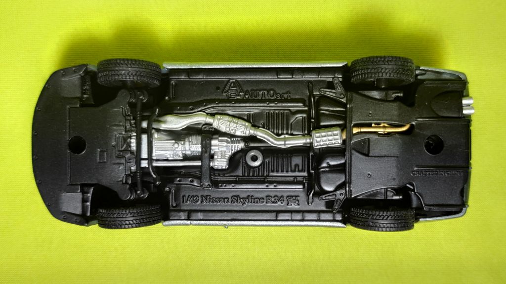 Модель 1/43 Nissan Skyline GT-R   (R34) V-spec ІІ   (AUTOart) - фото фото фото 7