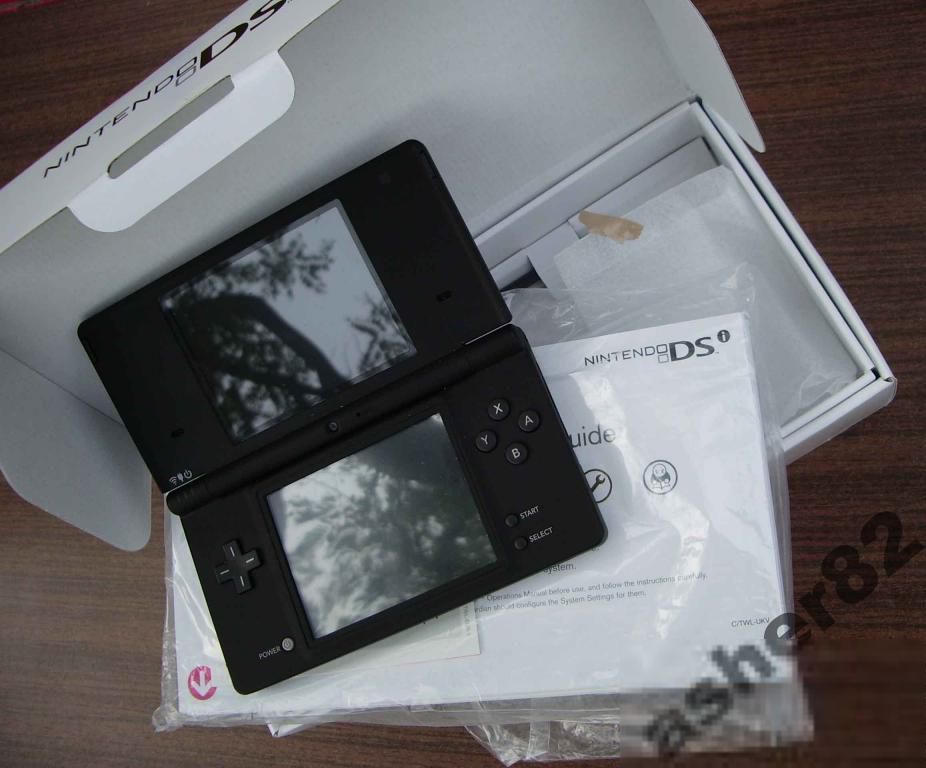 Портативную приставка Nintendo DSi     (PAL) - фото фото фото 0