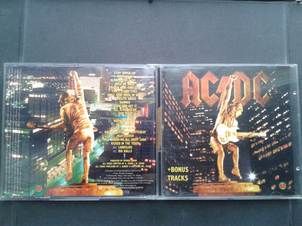 AC/DC - Stiff Upper Lip - фото фото фото 0