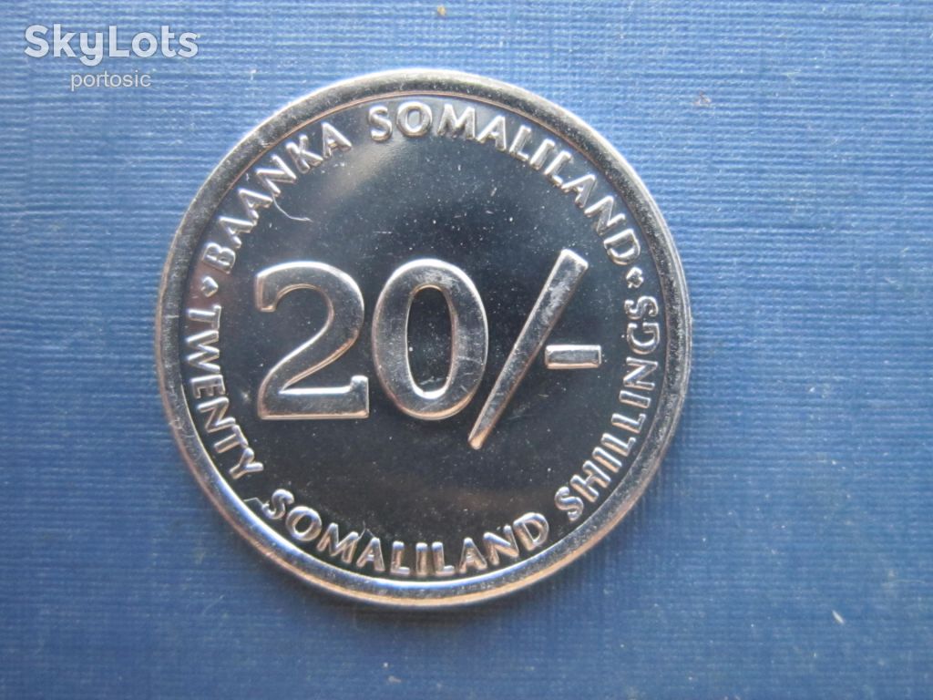 Монета 20 шиллингов Сомали Сомалиленд 2002 фауна собака - фото фото фото 1