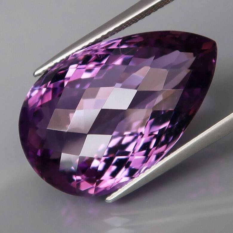 Аметист 27.49 ct    25.5 X 16.2 X 12 mm - фото фото фото 0