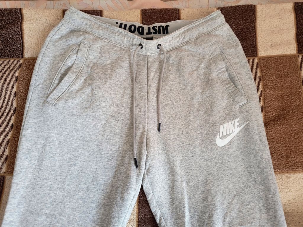 Штани спортивні Nike Rally Fleece Joggers - фото фото фото 1