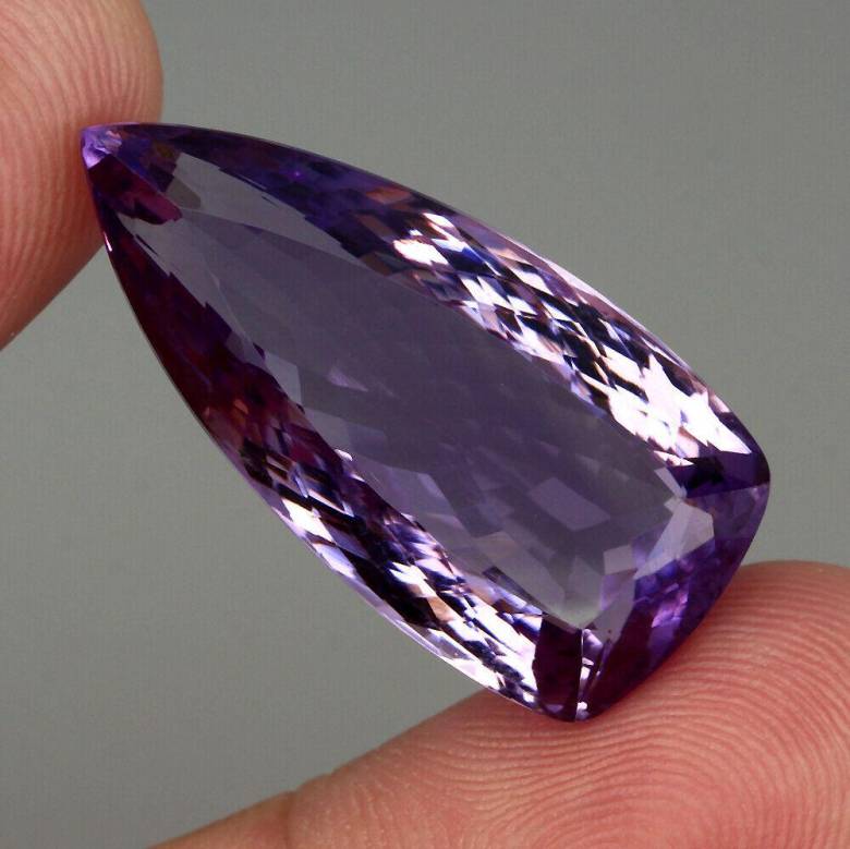 Натуральный аметист    38.51 Ct.  32x15mm - фото фото фото 1