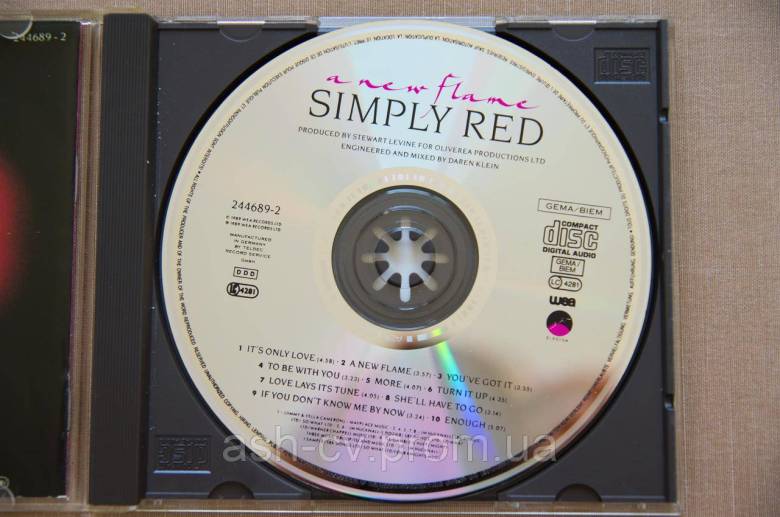 Музичний диск CD. SIMPLY RED - A NEW FLAME (1989) - фото фото фото 4