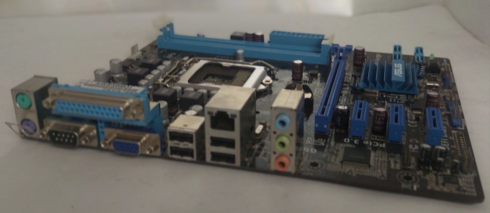 Материнська плата s1155 / ASUS P8H61-M LX3 R2.0 / MicroATX 2x DDR3  б/в - фото фото фото 3
