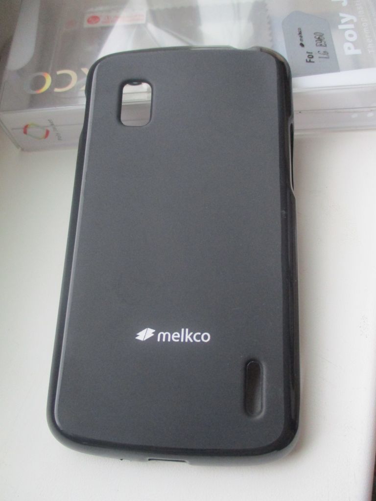 Фирменный чехол Melkco для LG Nexus 4 E960 - фото фото фото 0