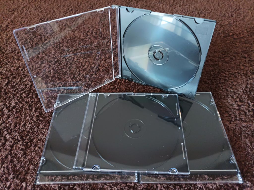10 боксов на 1-CD диске Slim с черным треем толщиной 5 мм.Тайвань. - фото фото фото 2