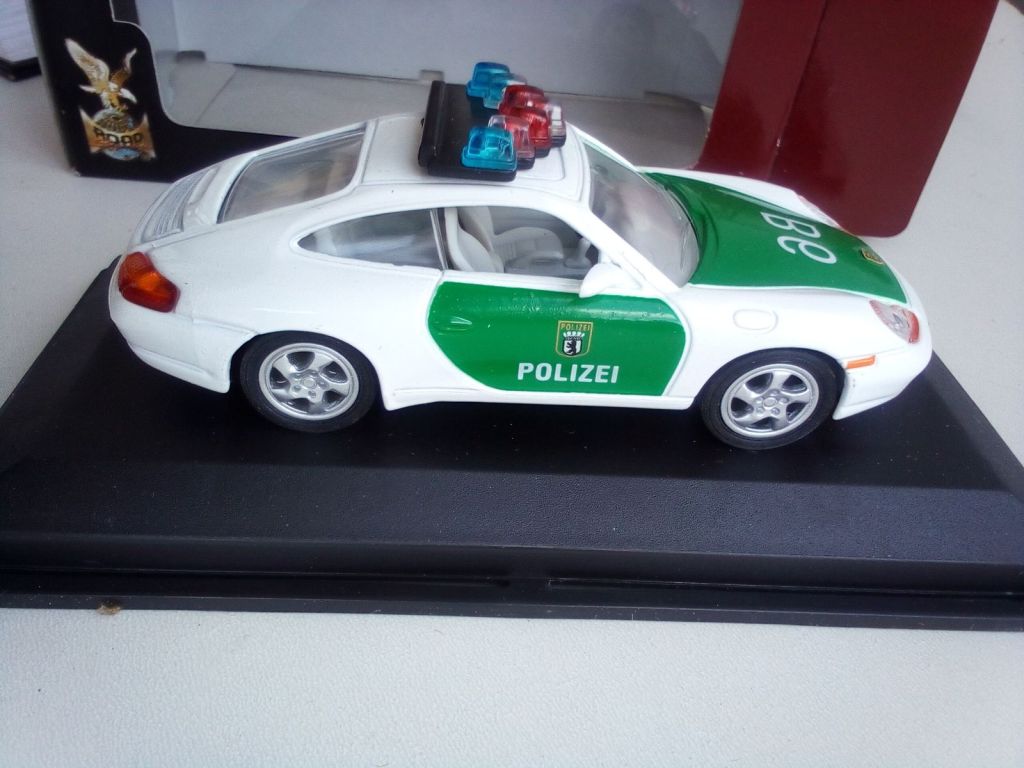 Porsche 996 Carrera 2 Polizei by Yat Ming 1:43 - фото фото фото 1