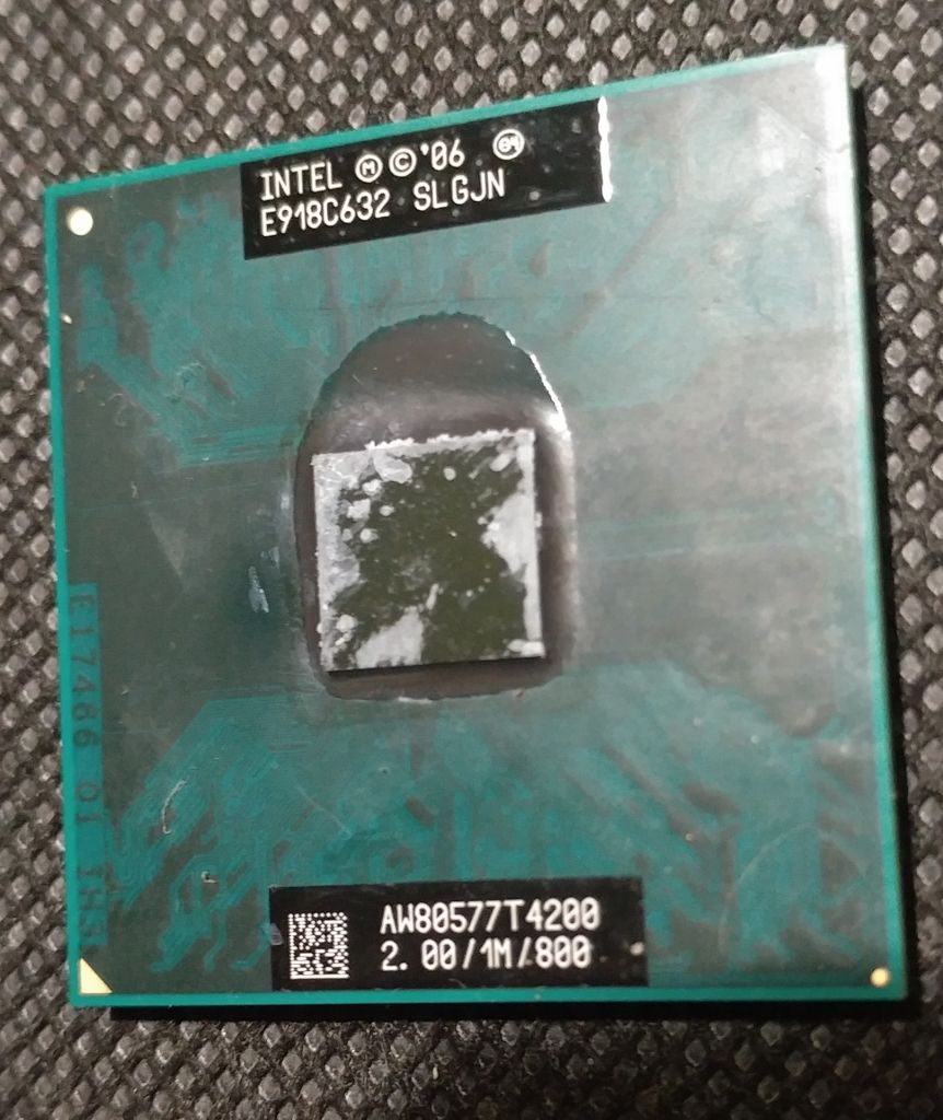 Процессор Intel Pentium Mobile T4200 Socket P 2.0ГГц 1М 800 - фото фото фото 0