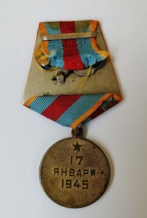 Медаль "За освобождение Варшавы".Сточенное ухо - фото фото фото 1