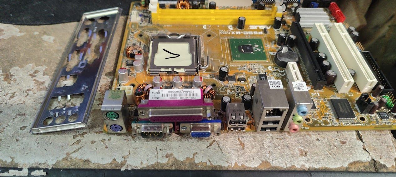 Мат. плата ASUS P5GC-MX/1333 LGA775 i945GC PCI-E+SVGA+LAN SATA MicroATX 2DDR2 № Р240407106 - фото фото фото 1