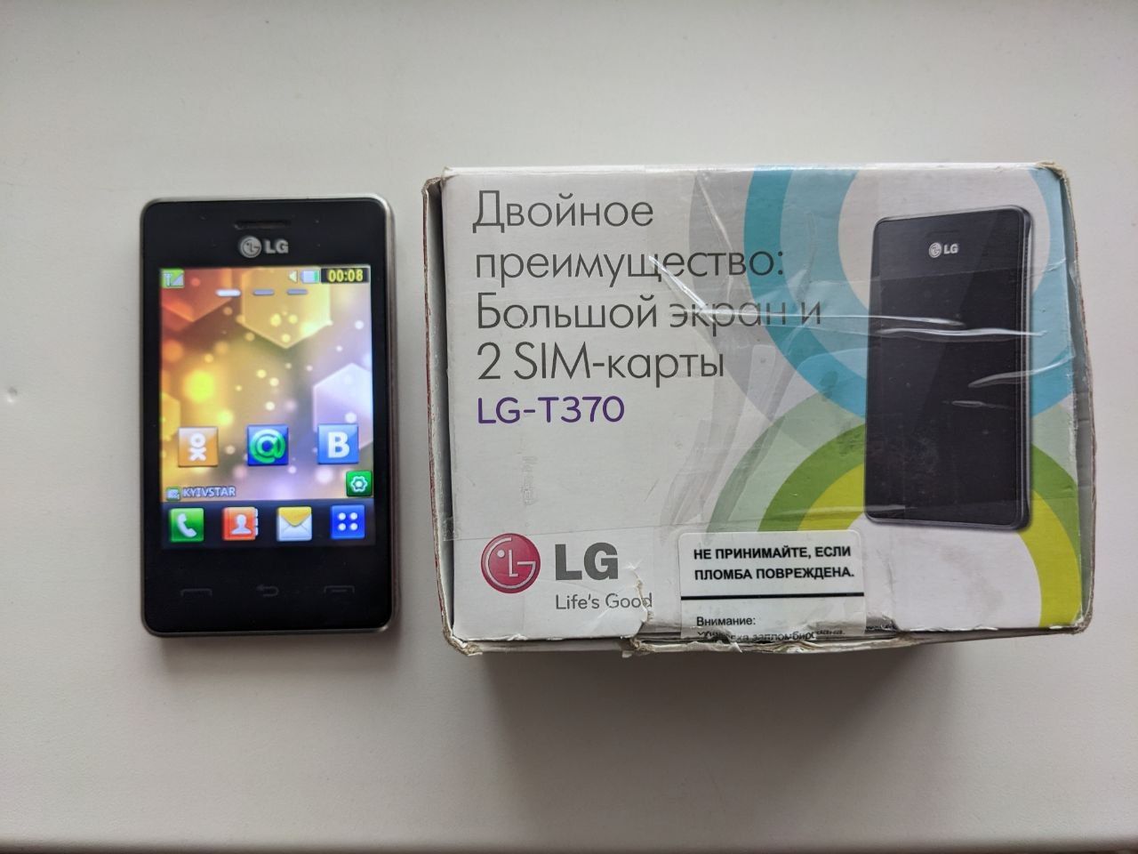 Мобільний телефон Lg  t370 red бу. - фото фото фото 4