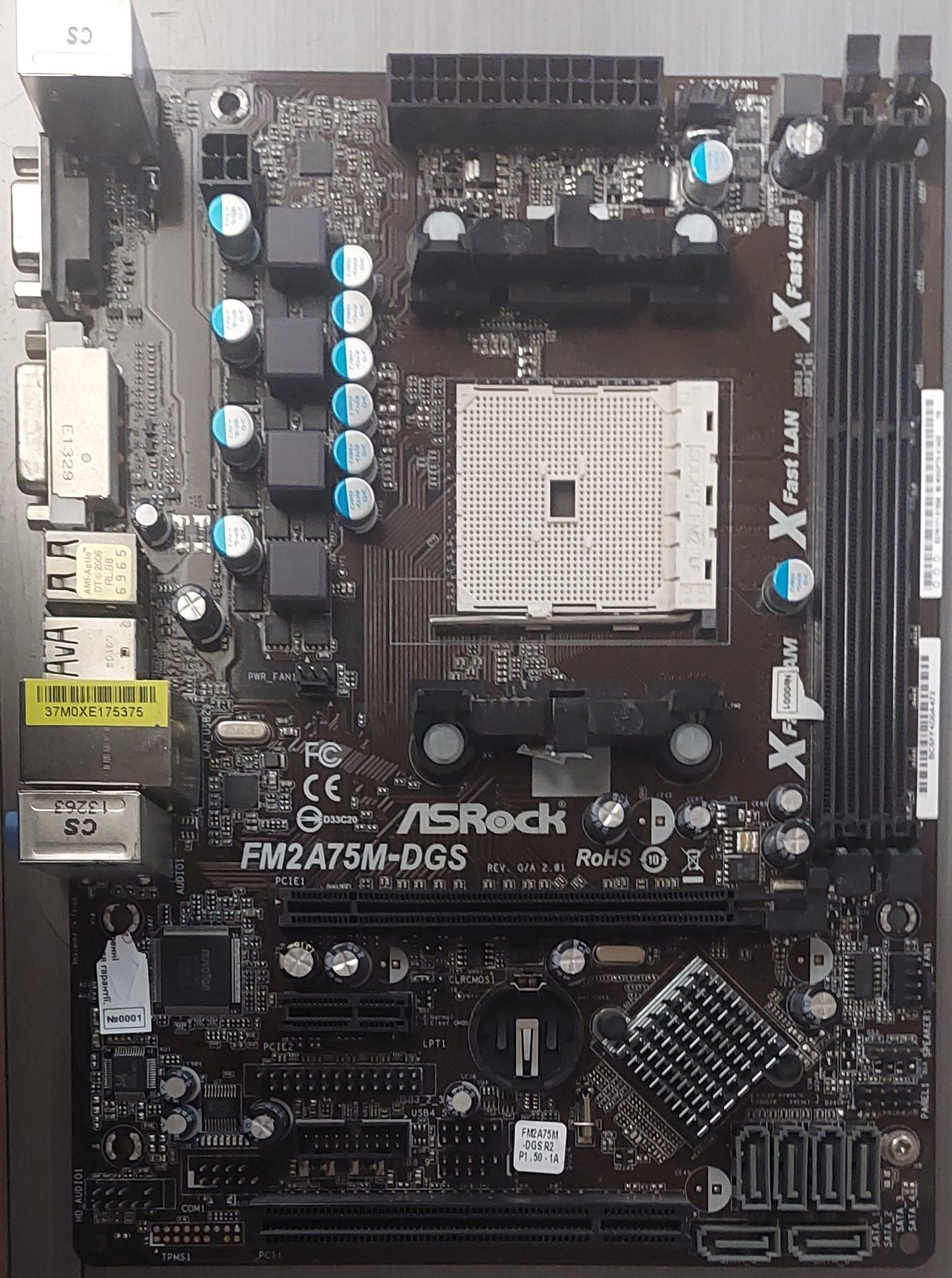 Б/В Материнська плата ASRock FM2A75M-DGS Socket FM2/MicroATX/2 x DDR3 - фото фото фото 0