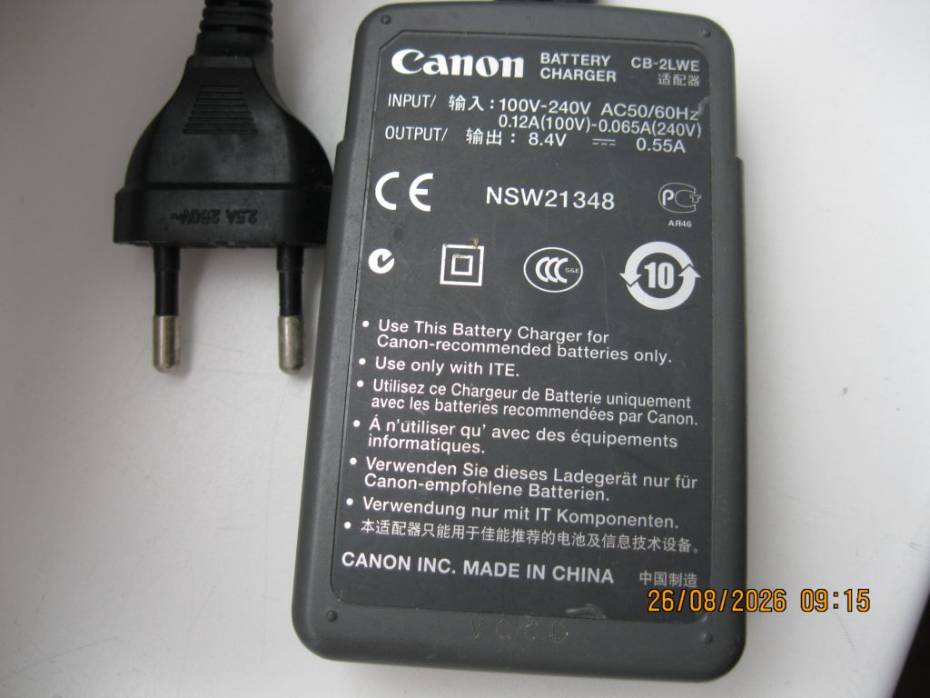 Зарядка видеокамеры Canon cb-2lwe 8.4в 0,55а - фото фото фото 1
