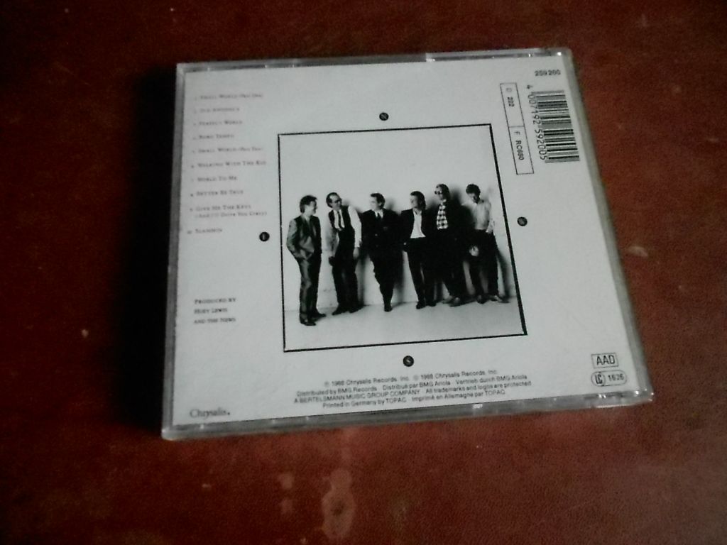 Huey Lewis And The News Small World CD фирменный б/у - фото фото фото 1