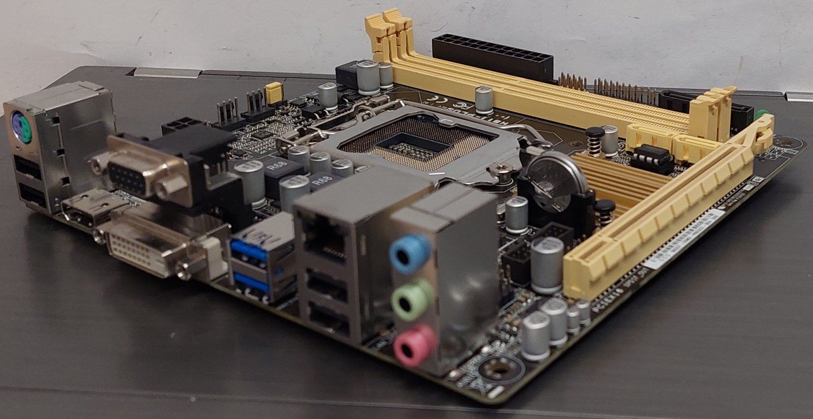 Материнська плата Asus H81I-Plus  / Socket 1150 / MiniITX / 2 x DDR3 / б/в - фото фото фото 2