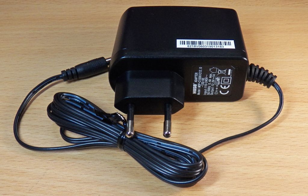 Адаптер живлення 12V 1A 12W AC/DC Новий 5,5*2,5mm Німеччина - фото фото фото 0