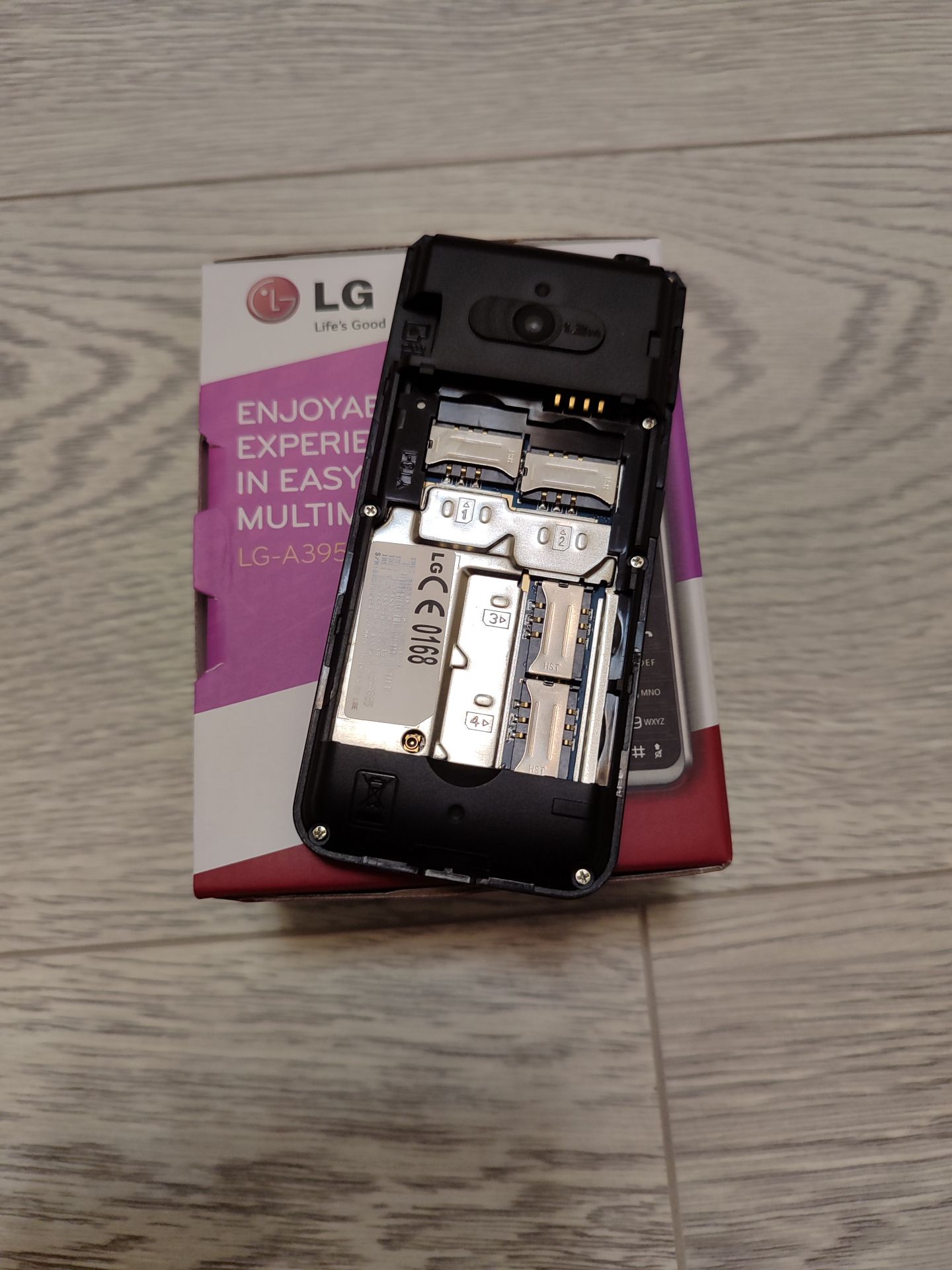 Lg A395 4 sim., оригинал, 1500 Mah - фото фото фото 4