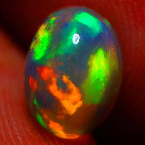 Эфиопский опал кабошон 1.24 CT AAA - фото фото фото 0
