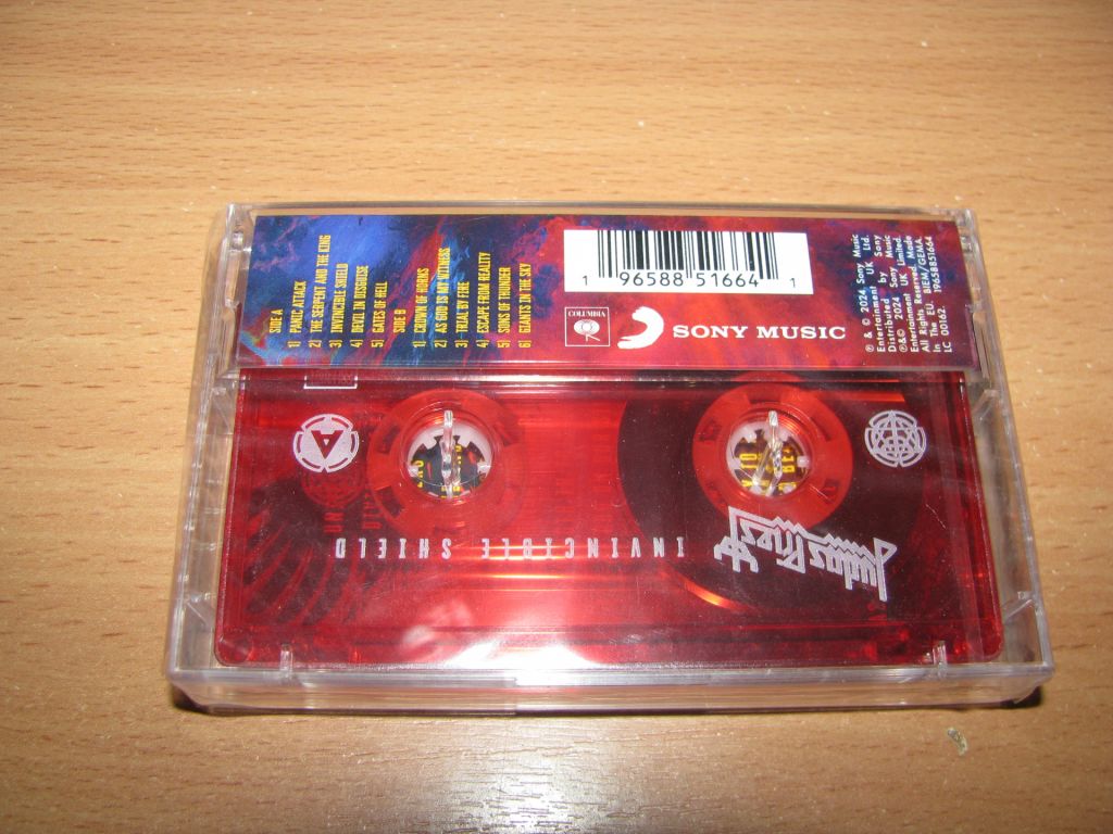 JUDAS PRIEST - Invincible Shield  (2024 Sony, RED CASSETTE) кассета - фото фото фото 1