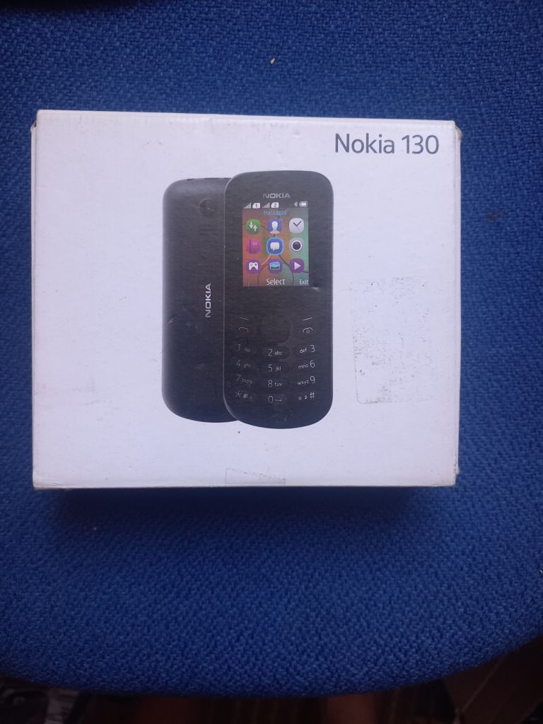 NOKIA 130. навушники і зарядка. - фото фото фото 2