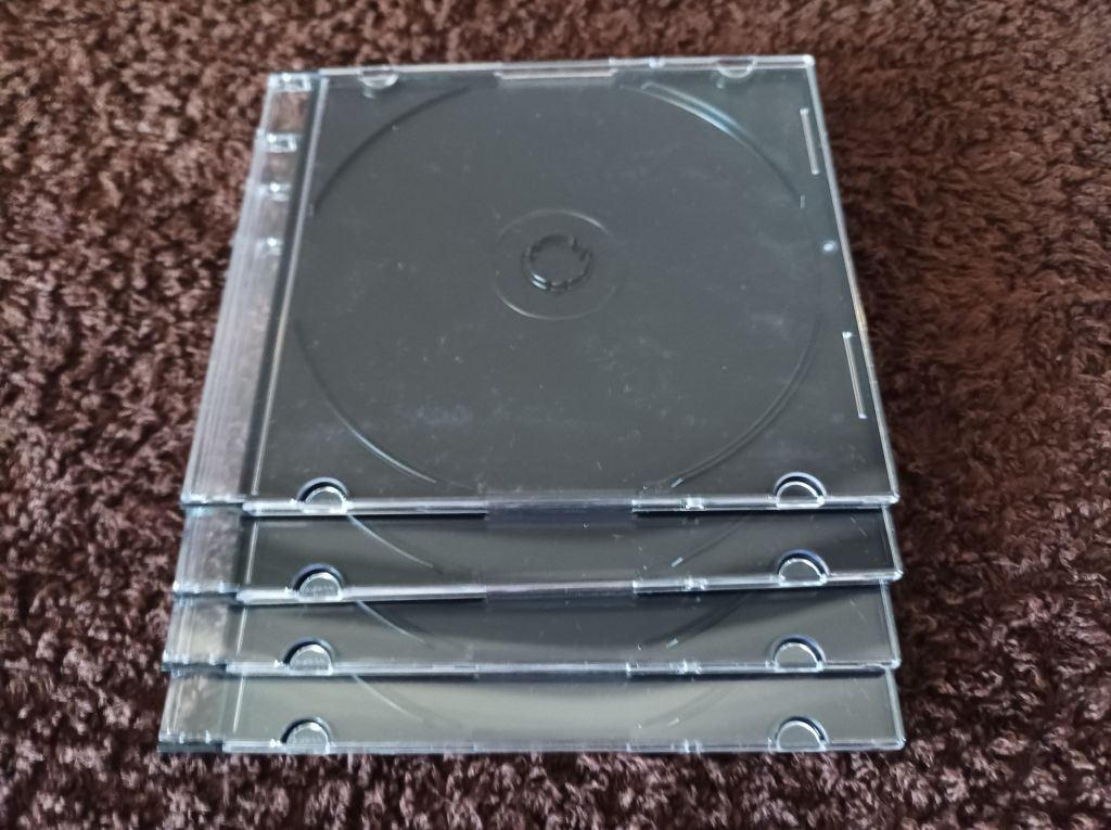 10 боксов на 1-CD диске Slim с черным треем толщиной 5 мм.Тайвань. - фото фото фото 3