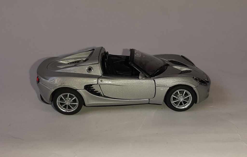 Модель Lotus Elise 111s, 2003г. Welly, номерная модель, масштаб 1:43. - фото фото фото 2