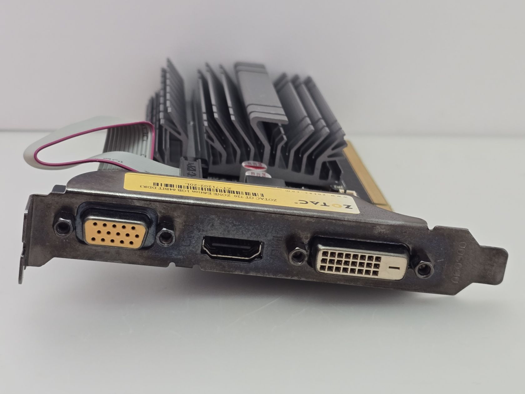 Відеокарта Zotac GeForce GT 720 1GB  (GDDR3,64Bit,PCI-E, Б/у) - фото фото фото 1