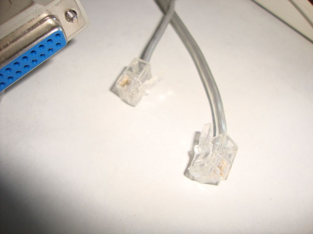 Hayes 5312HK External Accura 336/56K Fax Modem w/ Adapter - фото фото фото 3