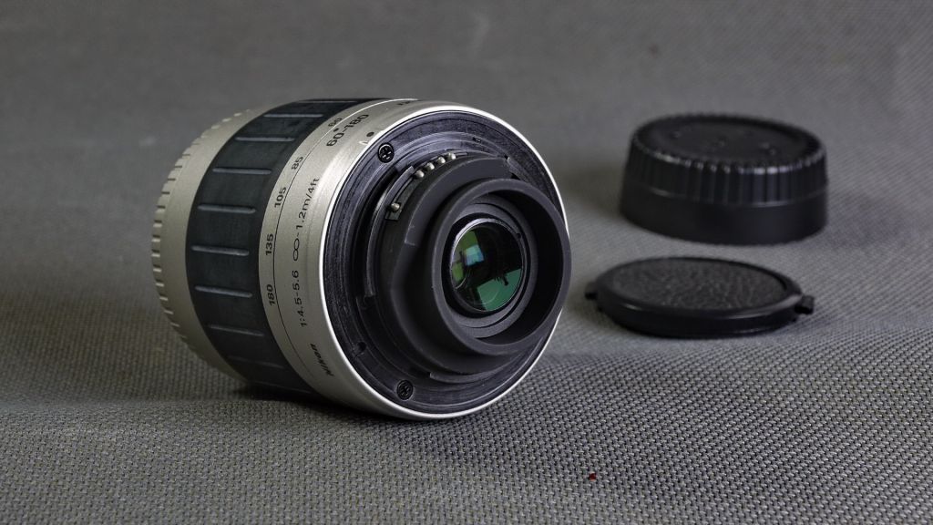 Об'єктив Nikon IX-NIKKOR 60-180mm 1:4-5.6 Ф52mm для камер APS формата Вживане - фото фото фото 1