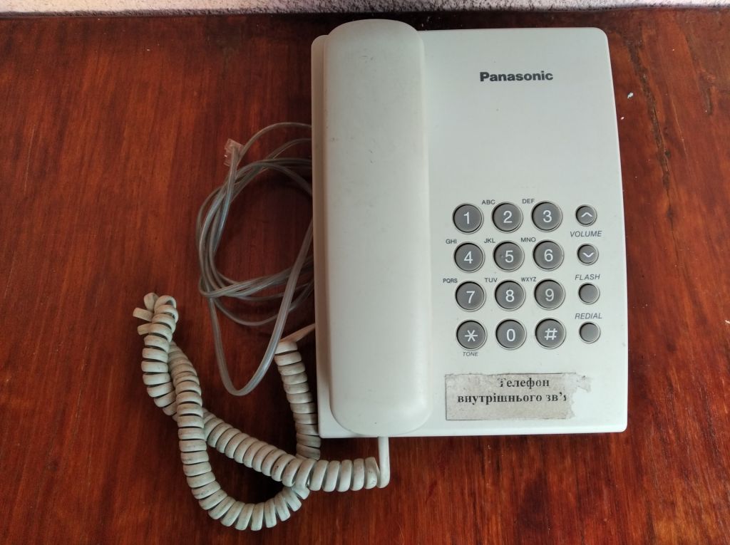 Телефон Panasonic KX-TS2350UAW - фото фото фото 1