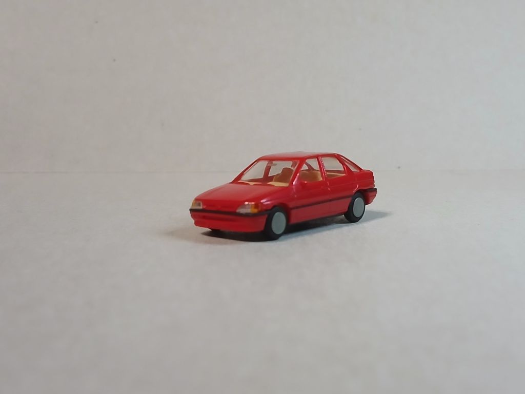 Автомобіль FORD ESCORT. PRALINE 1:87 H0  (11726.40/3). - фото фото фото 0