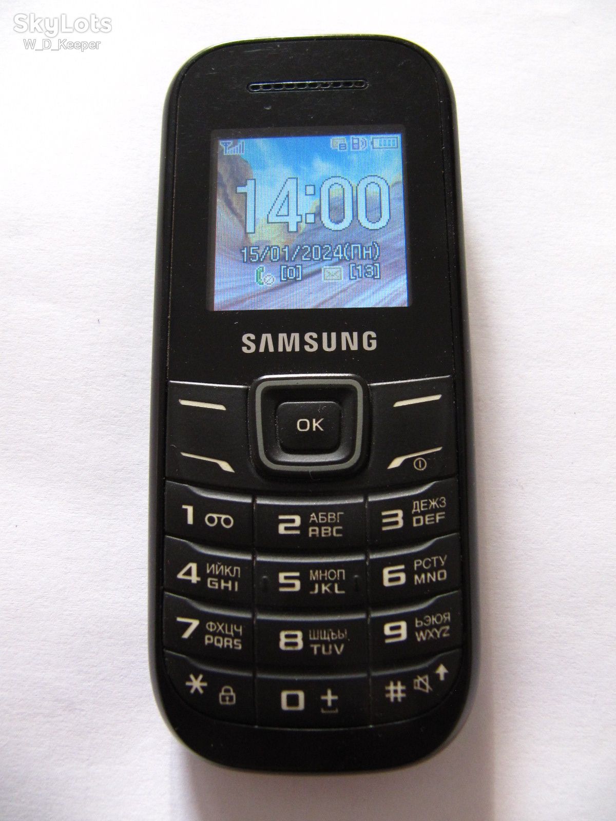 Samsung GT-E1200M в чудовому стані, з зарядкою та батареєю, робочий, кнопковий мобільний телефон - фото фото фото 1