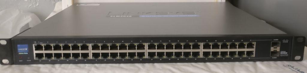 48-портовый гигабитный интеллектуальный коммутатор Gigabit Smart Switch Cisco SLM2048 - фото фото фото 0