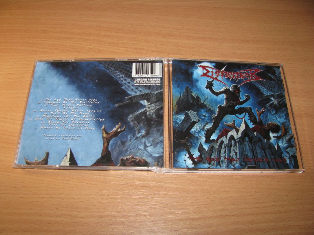 DISMEMBER - The God That Never Was  (2006 Regain 1st press) - фото фото фото 0