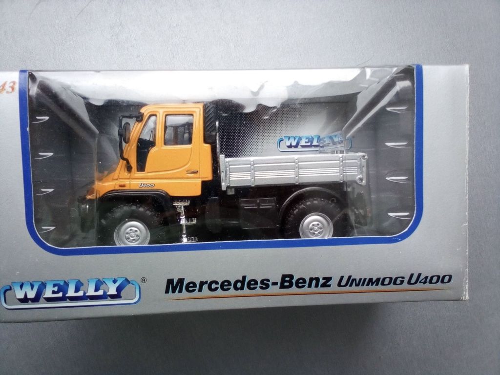 1/43 Welly Mercedes Benz Unimog U400 помаранчевий - фото фото фото 0