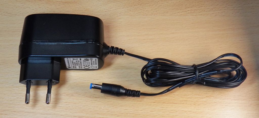 Адаптер живлення 12V 1A 12W AC/DC Новий 5,5*2,1mm Німеччина - фото фото фото 1