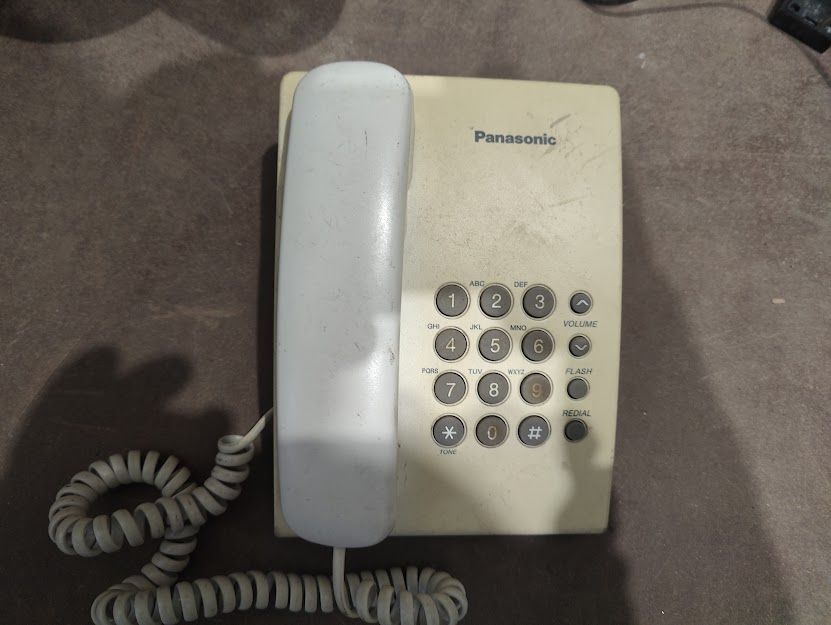 Проводной телефон Panasonic KX-TS2350UAW № 251905109 - фото фото фото 0