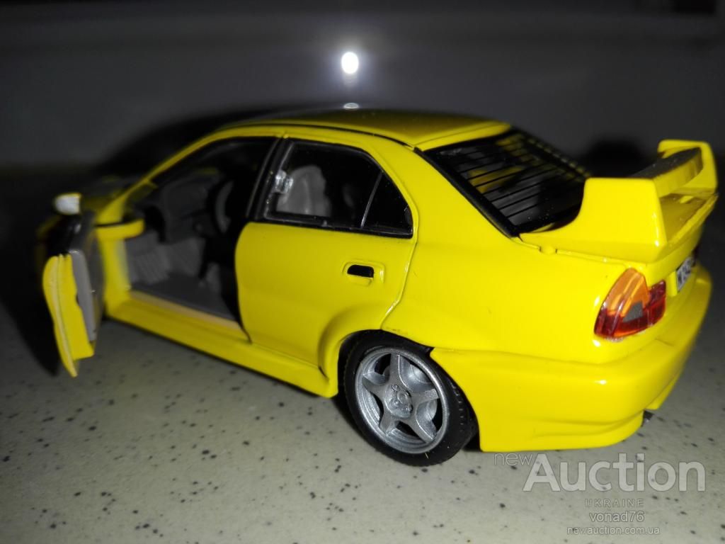 1/43 MITSUBISHI LANCER. CARARAMA. - фото фото фото 1