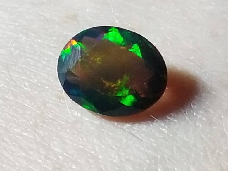 Черный опал 1.42 Ct   9.60 x 7.64 x 4.88 MM - фото фото фото 4