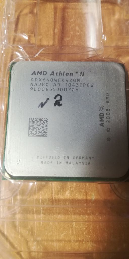 Процессор AMD Athlon II X4 640 4 Ядра, 3.0GHz, sAM3 / AM2+ - фото фото фото 5