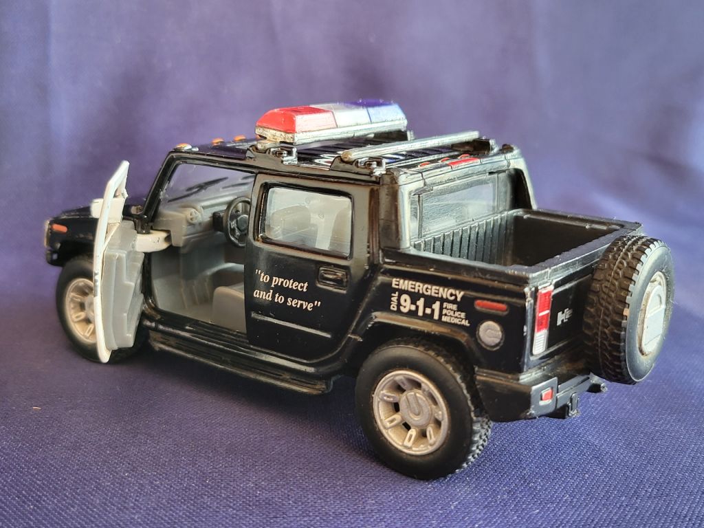 Модель машинка Hummer H2 SUT Police. масштаб 1;40 - фото фото фото 4