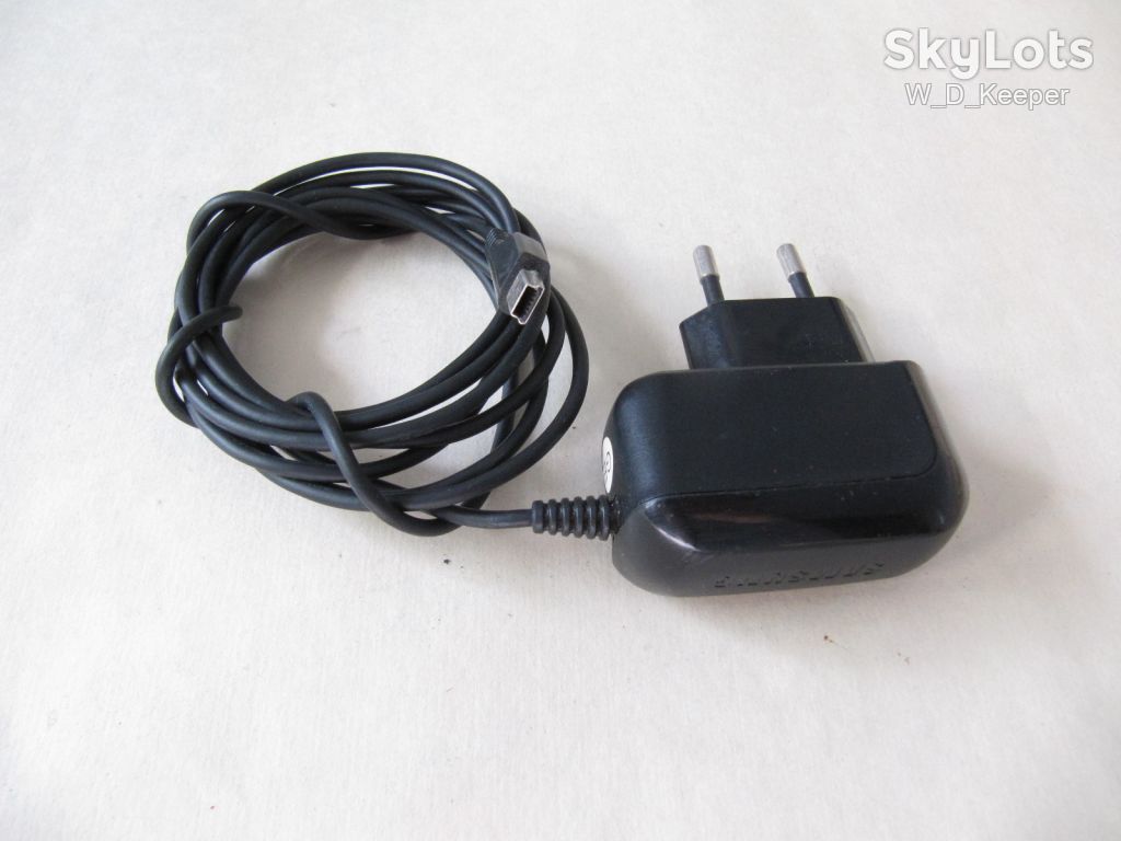Зарядка Samsung ATADN30EBE 4.75V 0.55A, miniUSB, робоча, універсальна - фото фото фото 1