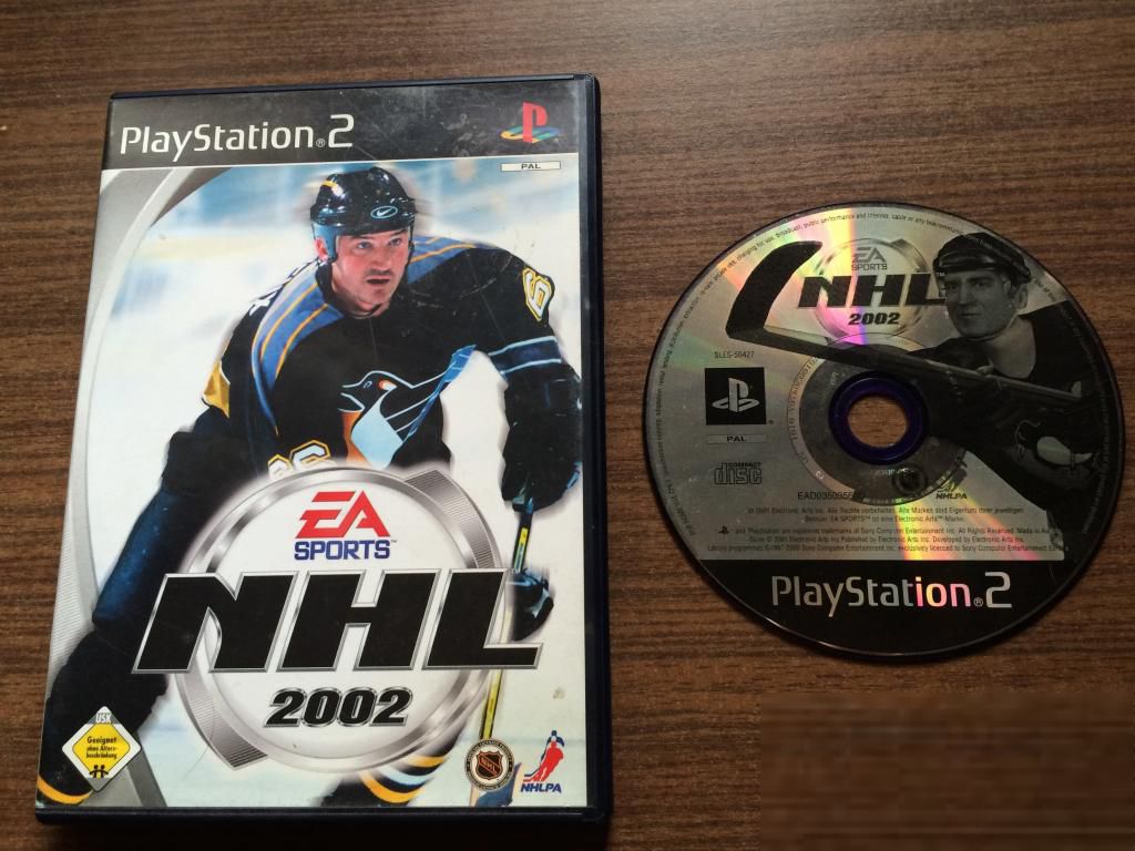 Игра на PS2 "NHL 2002"      (PAL) - фото фото фото 0