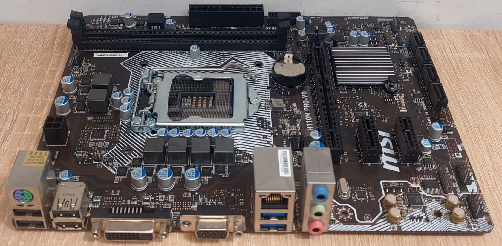 Материнська плата MSI H110M PRO-VD  Socket 1151/MicroATX/2 x DDR4  б/в - фото фото фото 1