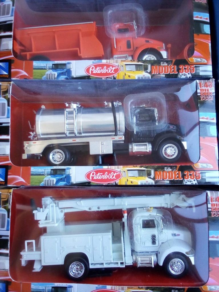 Вантажівки New Ray моделі 1:43 Peterbilt MAN - фото фото фото 6