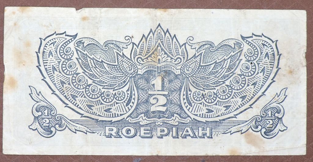 Нидерландская Индия   (Индонезия) оккупация 1/2 рупій 1944 - фото фото фото 1
