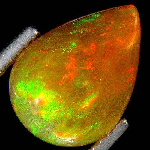 Эфиопский опал кабошон  2.50Ct  12.77 x 9.36 x 5.12 mm - фото фото фото 0